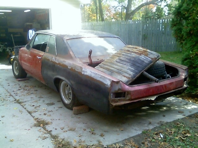 About: 1965 Pontiac GTO. here it is when we brought it home.. it dont 