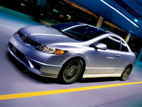 2010 Honda Civic Coupe All Coupe trims other than the Si come equipped with