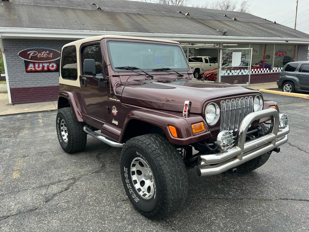 Red 2002 Jeep Wrangler Sahara, Image 0