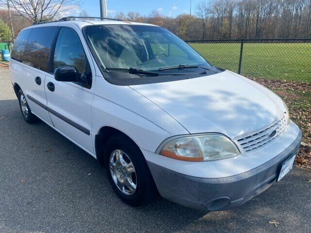 white ford minivan