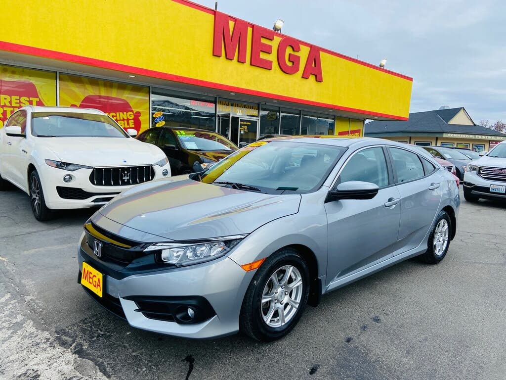 Total 89+ imagen honda civic windows rolling down by themselves In