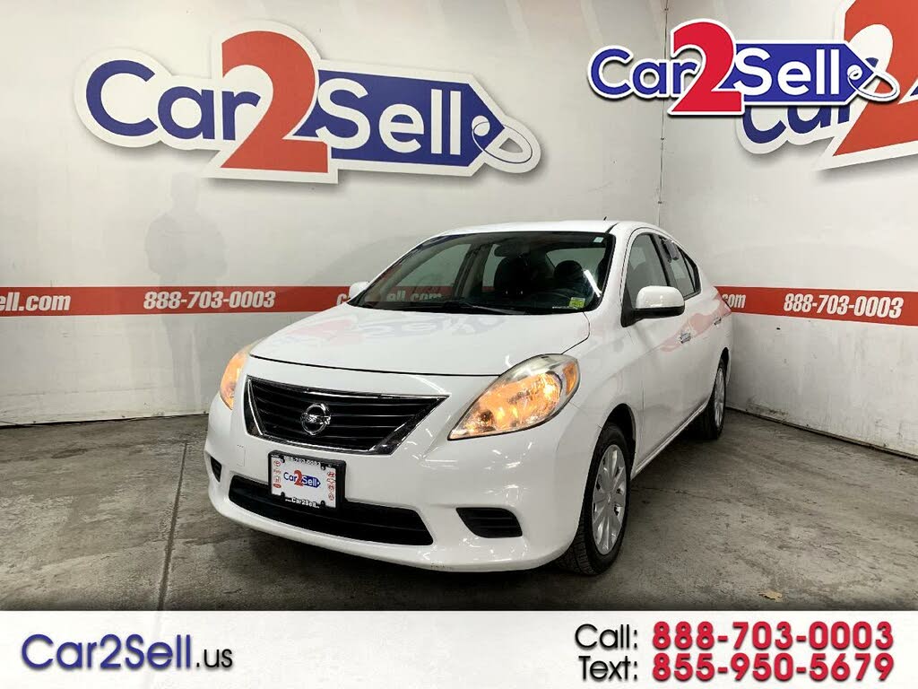 used nissan versa under $5 000