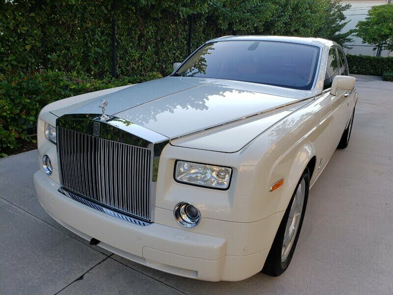 Soi dàn xe sang của Chủ tịch Tân Hoàng Minh Nổi bật nhất là RollsRoyce  Phantom Rồng hơn 35 tỷ đồng