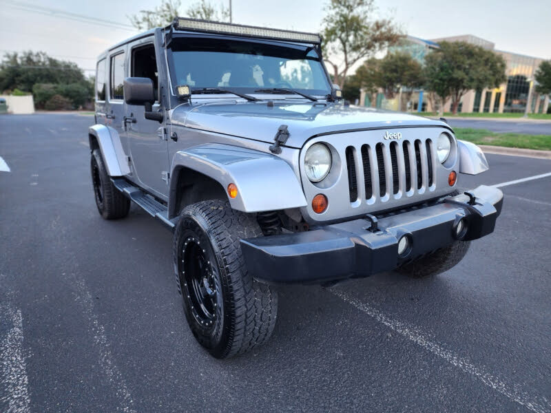 Pre-Owned 2013 Jeep Wrangler Unlimited Sahara Sport Utility in Afton  #UET1401A