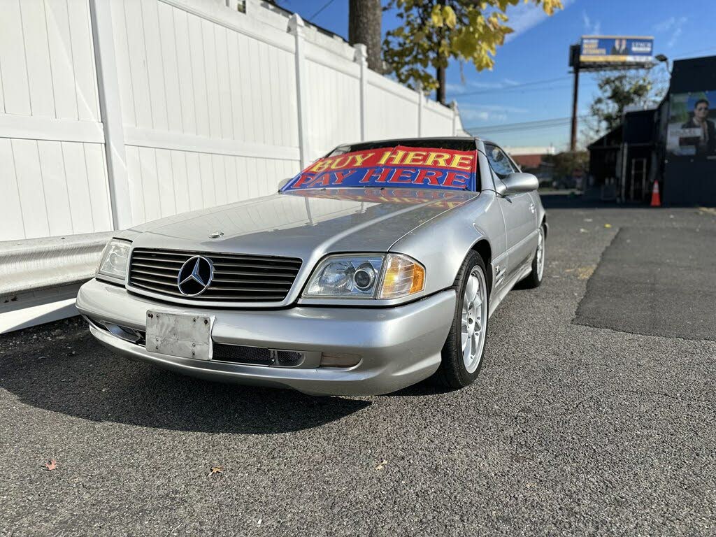 https://static.cargurus.com/images/forsale/2023/11/20/17/31/1999_mercedes-benz_sl-class-pic-8792365198902940361-1024x768.jpeg