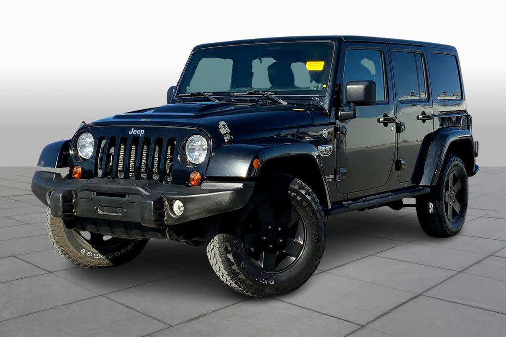 Pre-Owned 2013 Jeep Wrangler Unlimited Sahara Sport Utility in Afton  #UET1401A