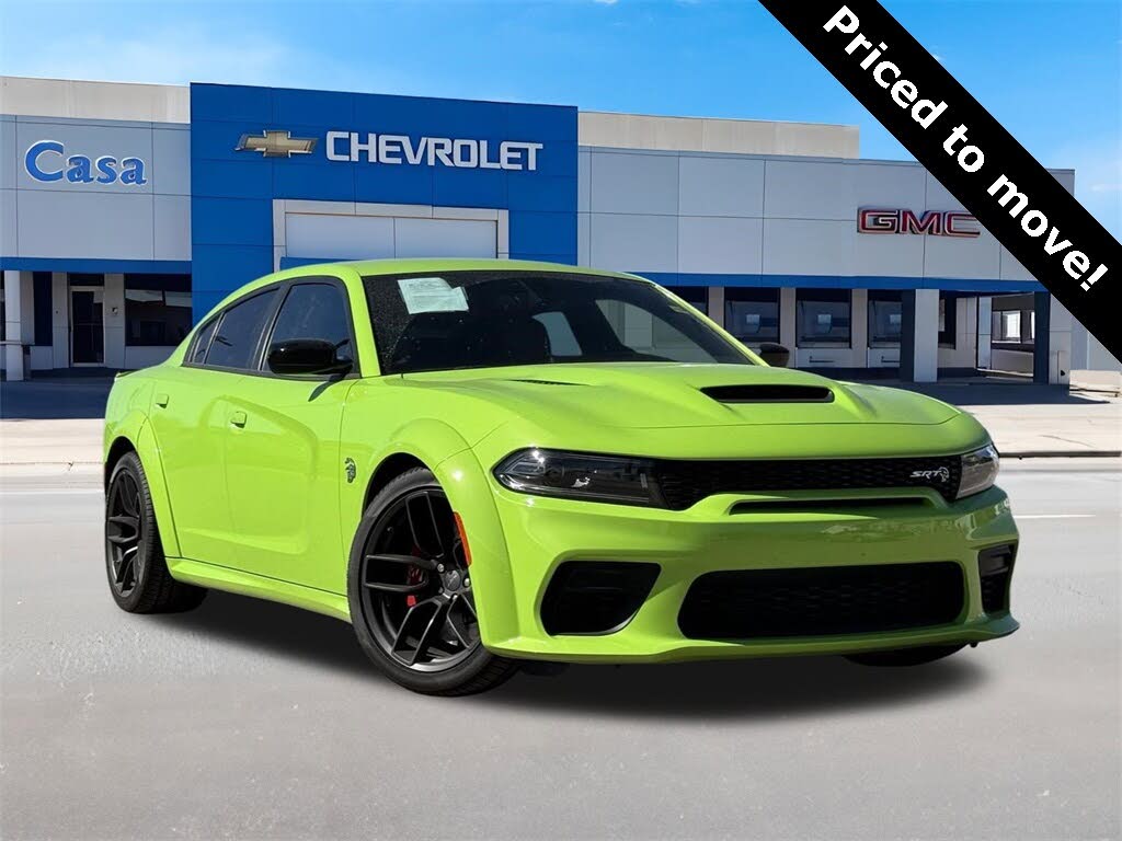 https://static.cargurus.com/images/forsale/2024/01/05/01/41/2023_dodge_charger-pic-4761366971210671384-1024x768.jpeg