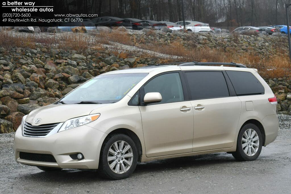 Tan 2024 toyota minivan