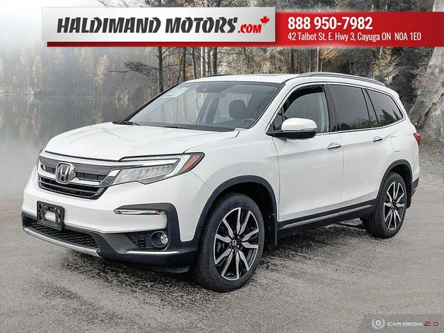 Honda Pilot Touring AWD with Rear Captains Chairs 2021
