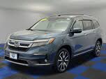 Honda Pilot Touring AWD with Rear Captains Chairs