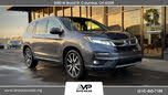 Honda Pilot Touring AWD with Rear Captains Chairs