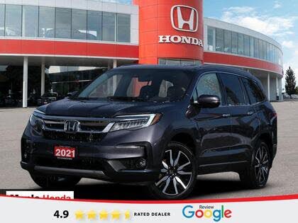 2021 Honda Pilot Touring AWD with Rear Captains Chairs