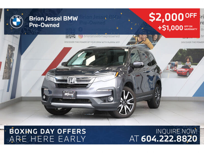 2021 Honda Pilot Touring AWD with Rear Captains Chairs