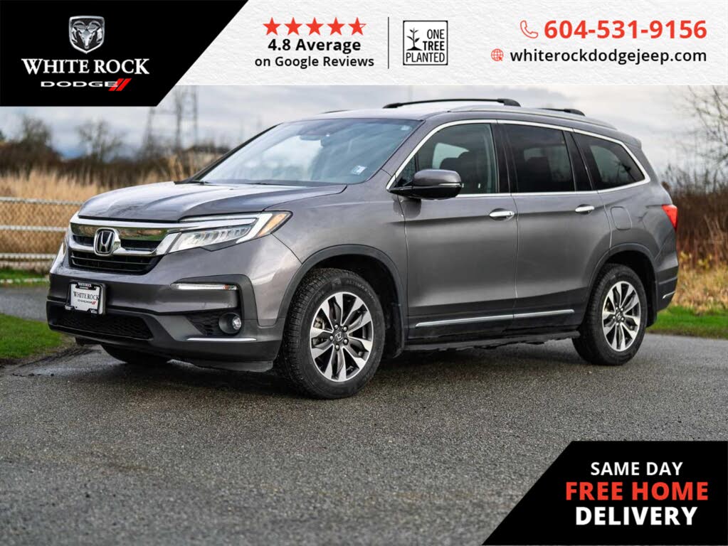 Honda Pilot Touring AWD with Rear Captain's Chairs 2020