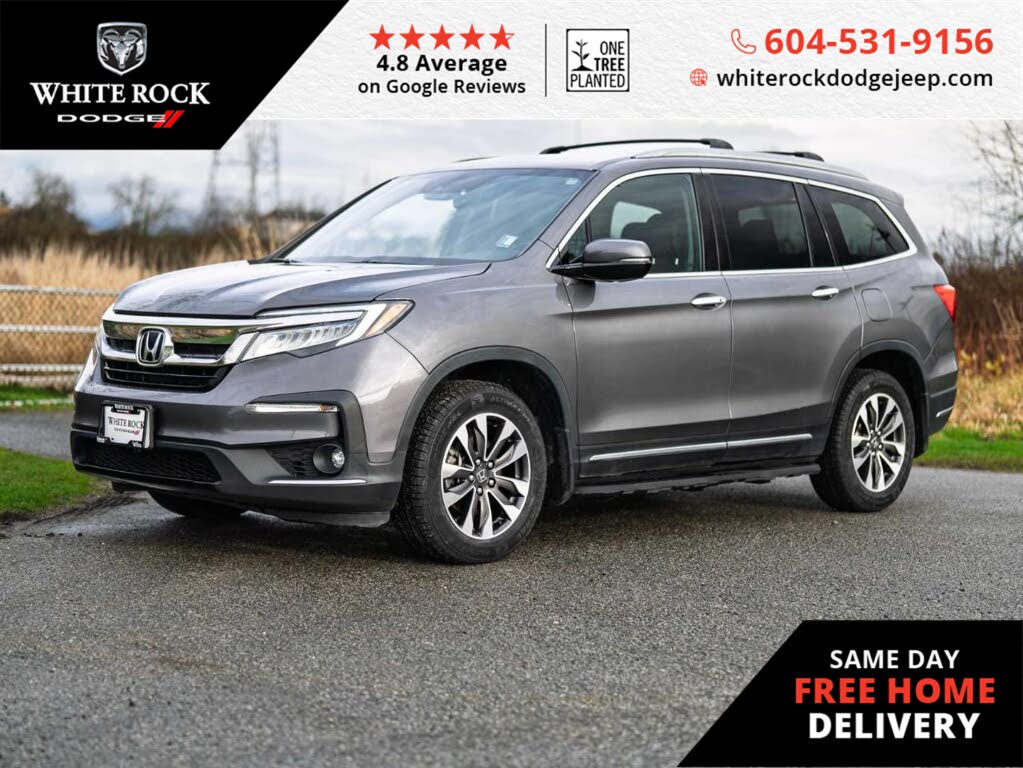 2020 Honda Pilot Touring AWD with Rear Captain's Chairs