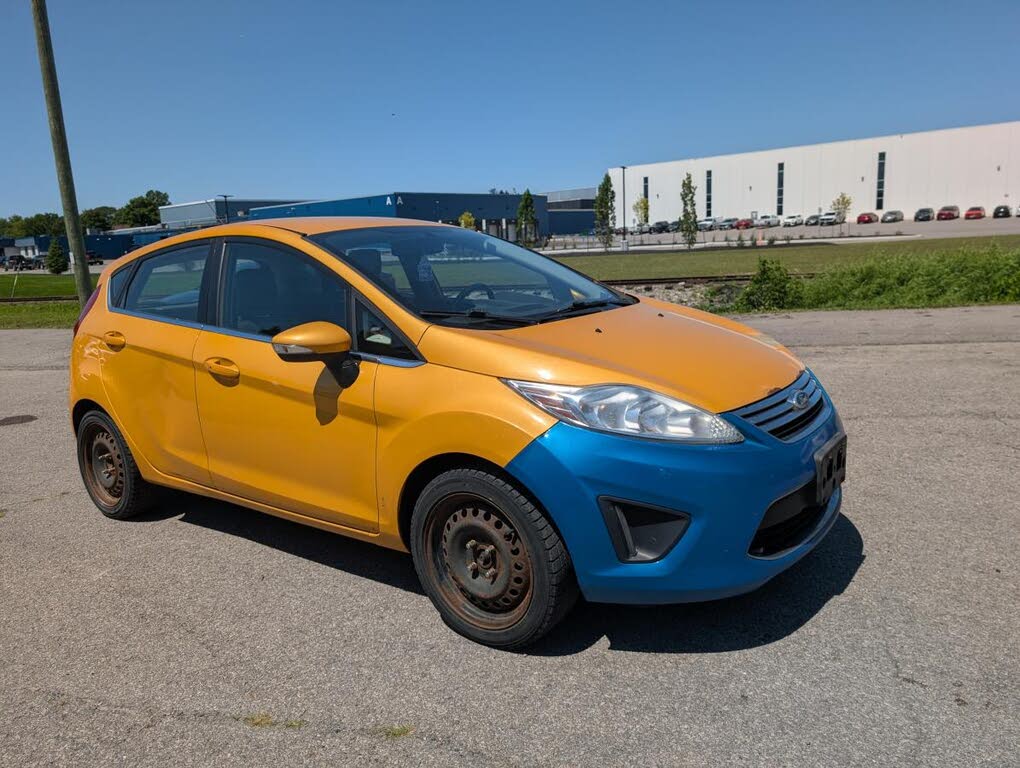 Yellow 2011 Ford Fiesta Hatchback Front-Wheel Drive Automatic