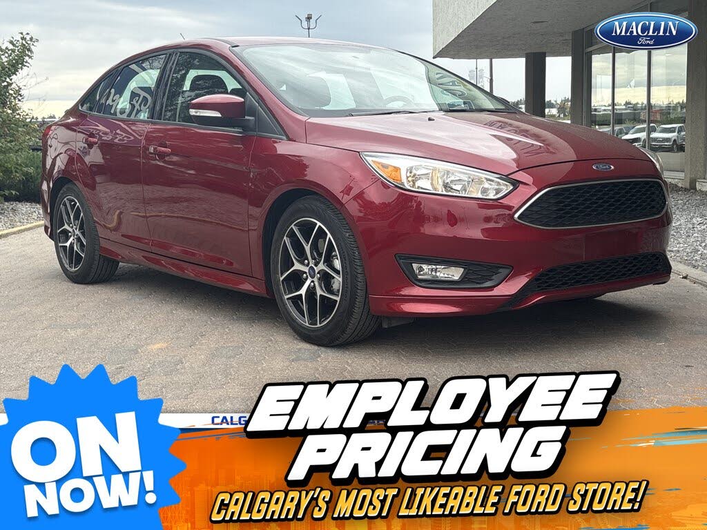 Red 2015 Ford Focus Sedan Front-Wheel Drive Manual