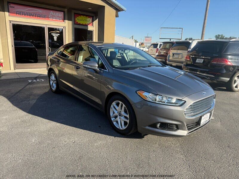 Ingot Silver Metallic 2014 Ford Fusion Sedan Front-Wheel Drive Automatic
