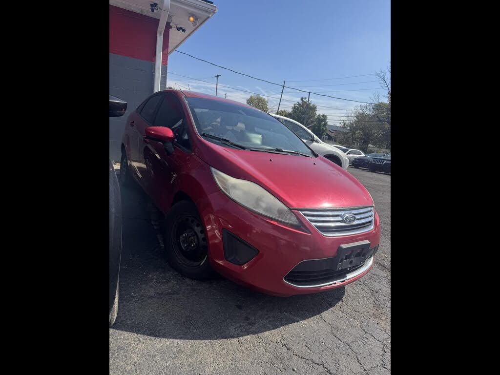Red 2012 Ford Fiesta Sedan Front-Wheel Drive Manual