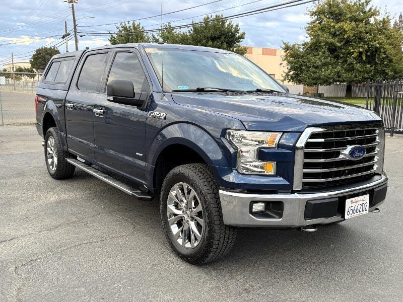 Blue 2016 Ford F-150 Pickup Truck Four-Wheel Drive Automatic