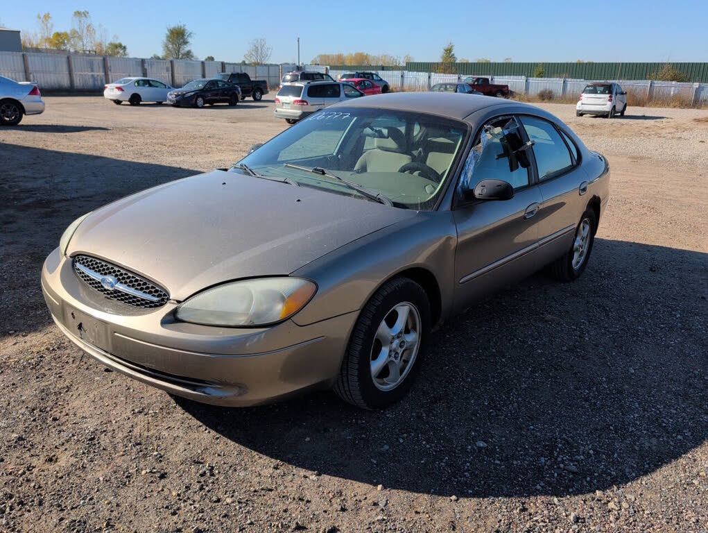 Gold 2003 Ford Taurus Sedan Front-Wheel Drive 4-Speed Automatic
