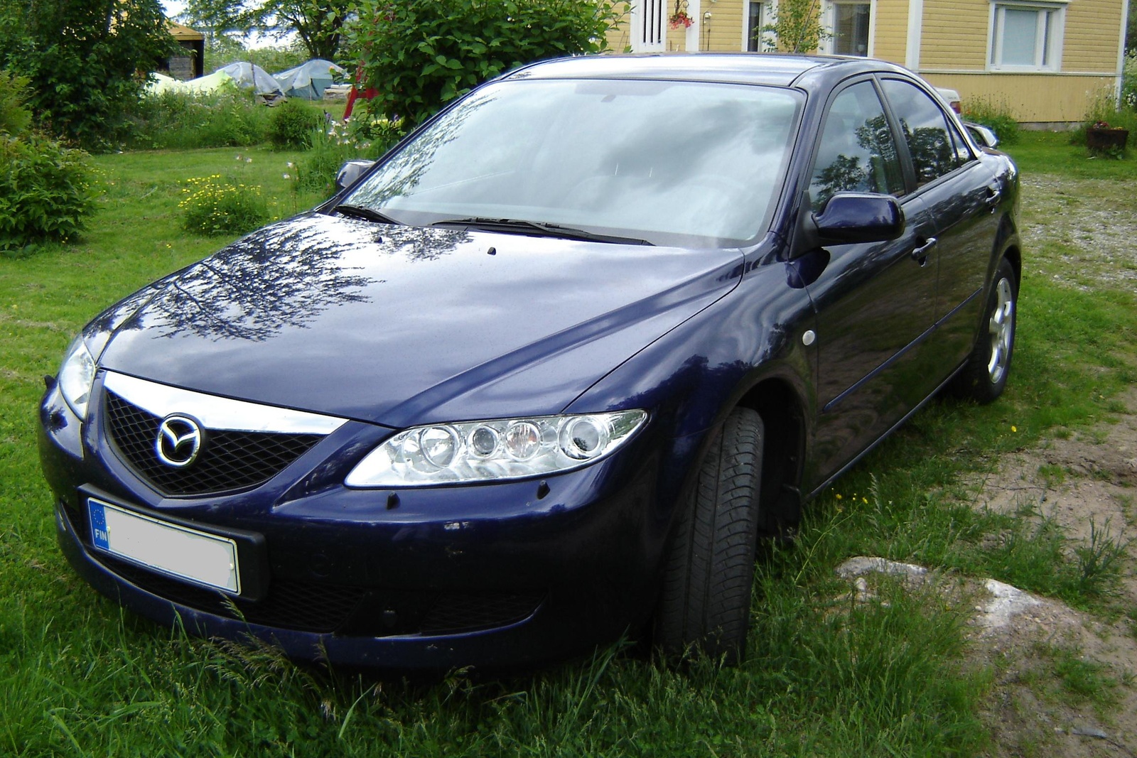 Фото mazda 6 2005 года темно серого цвета