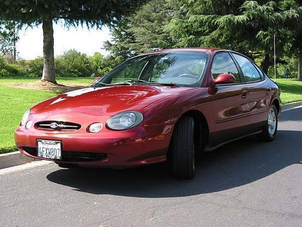 Blue book value for 1999 ford taurus #7