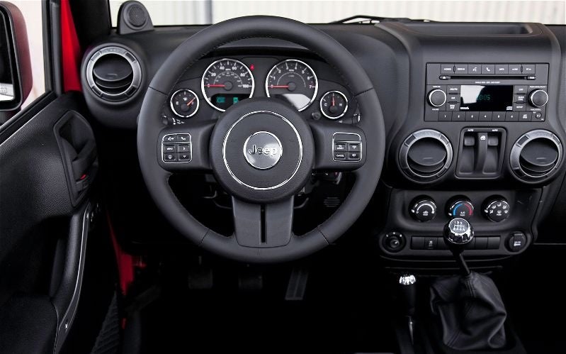 Jeep Wrangler Questions - I purchased a 2012 Jeep Wrangler Sport. There  happens to be a red togg... - CarGurus