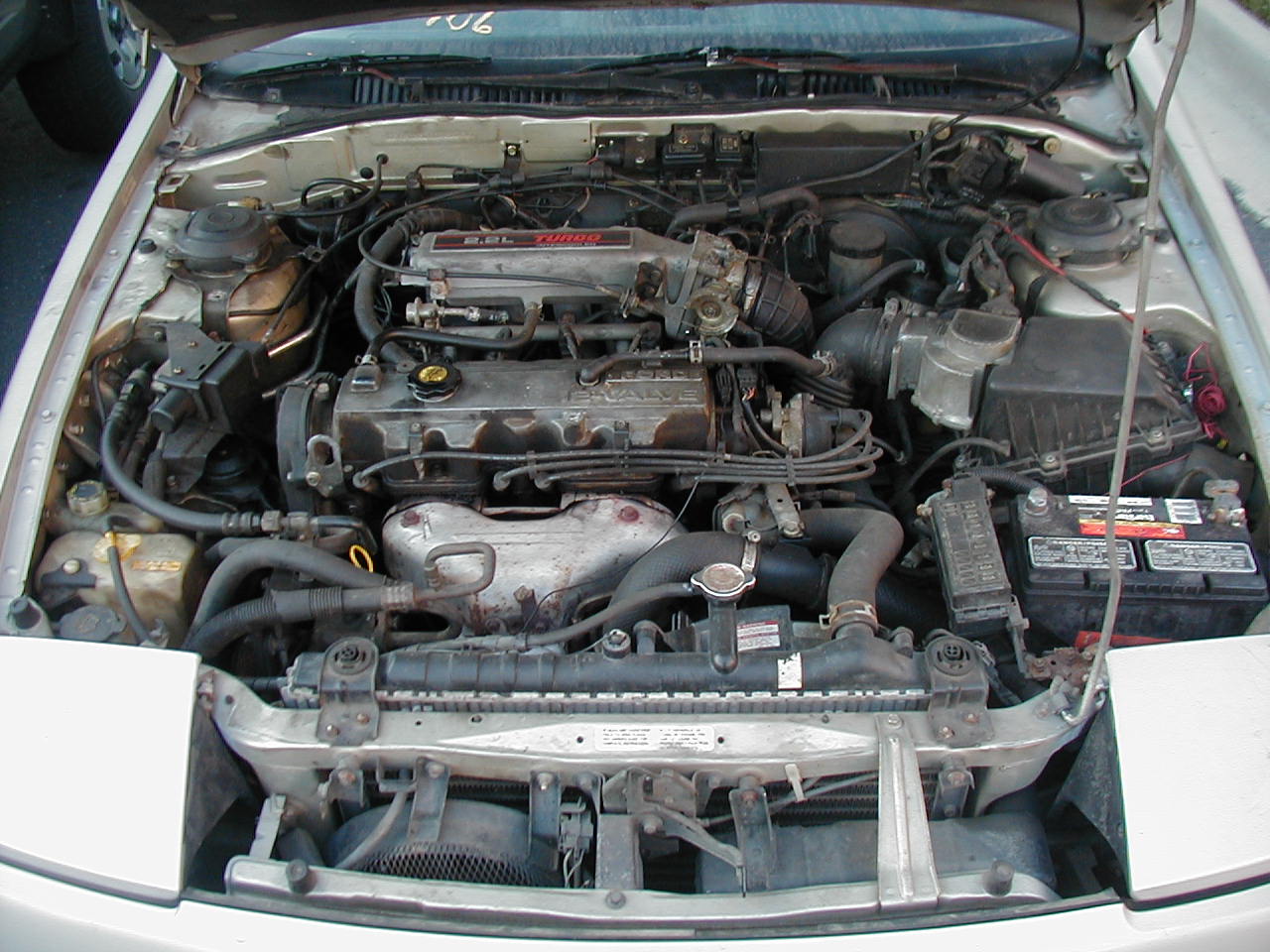 Where is the starter on a 1989 ford probe