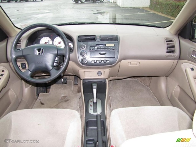 Хонда левый руль. Honda Civic 2002 салон. Honda Civic 2002 седан. Honda Civic 2004 Interior LX. Honda Civic 2001 седан салон.