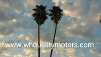 Woodland Hills Quality Motors logo