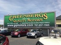 Greenbergs Quality Motors logo