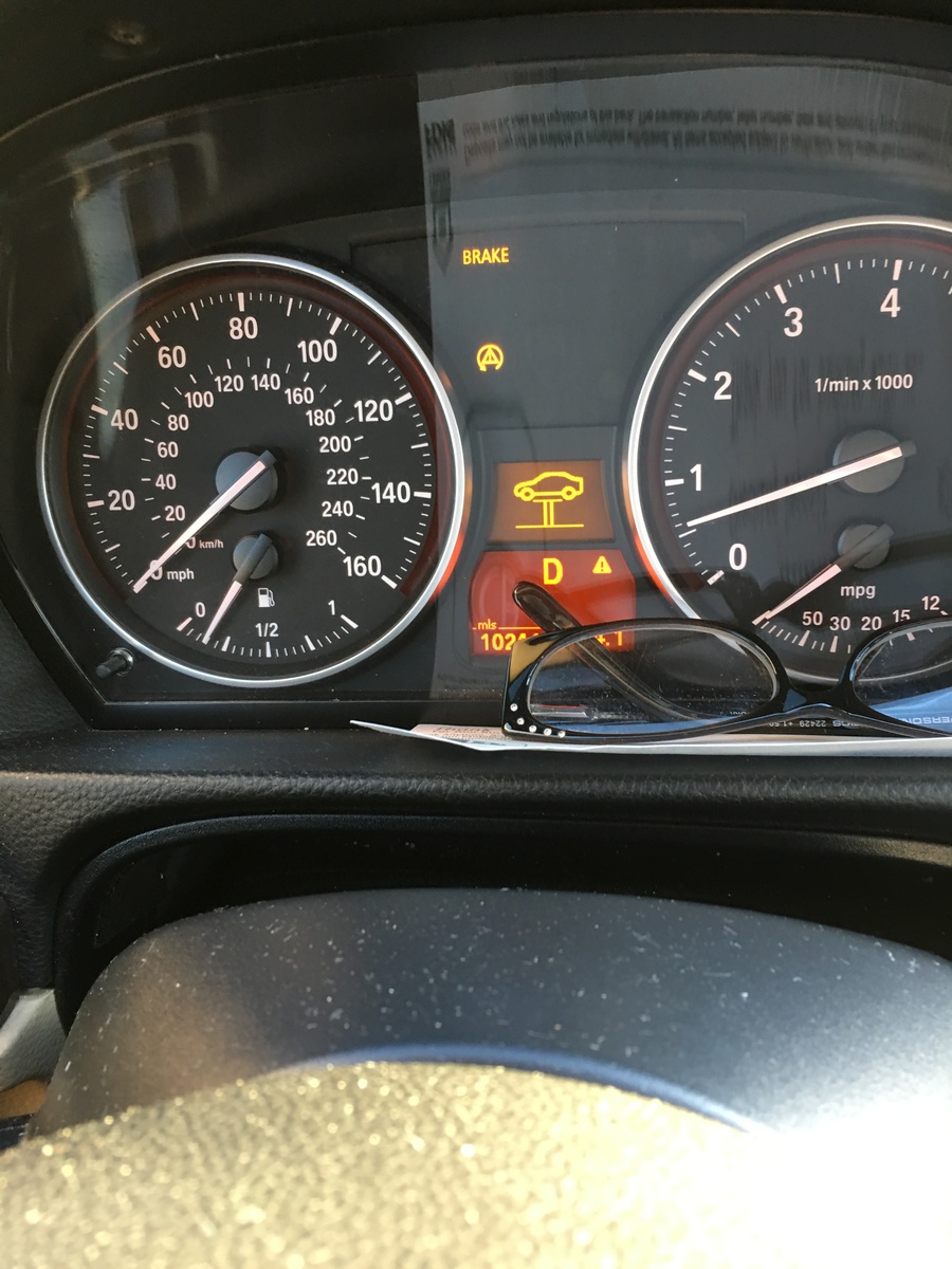 What Does The Triangle Light Mean On Bmw