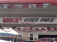 Mikes Used Cars logo